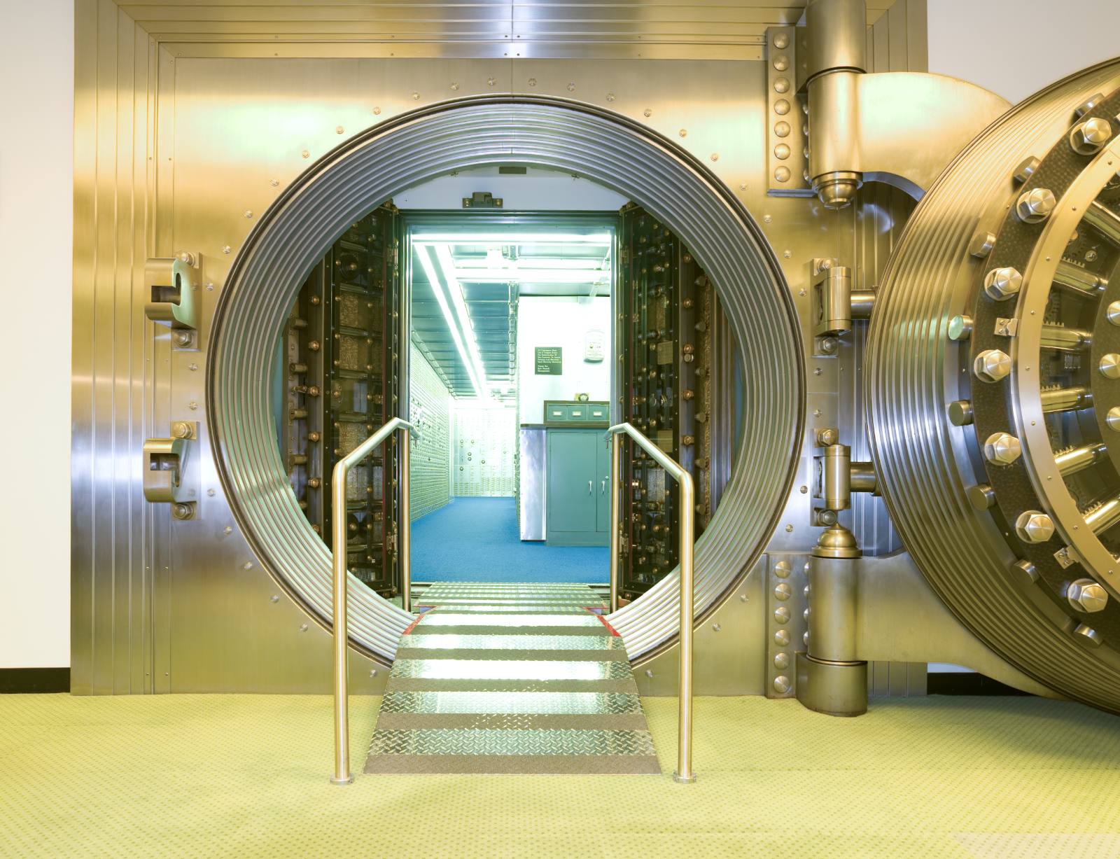 Interior of a secure vaulting facility with an open circular vault door